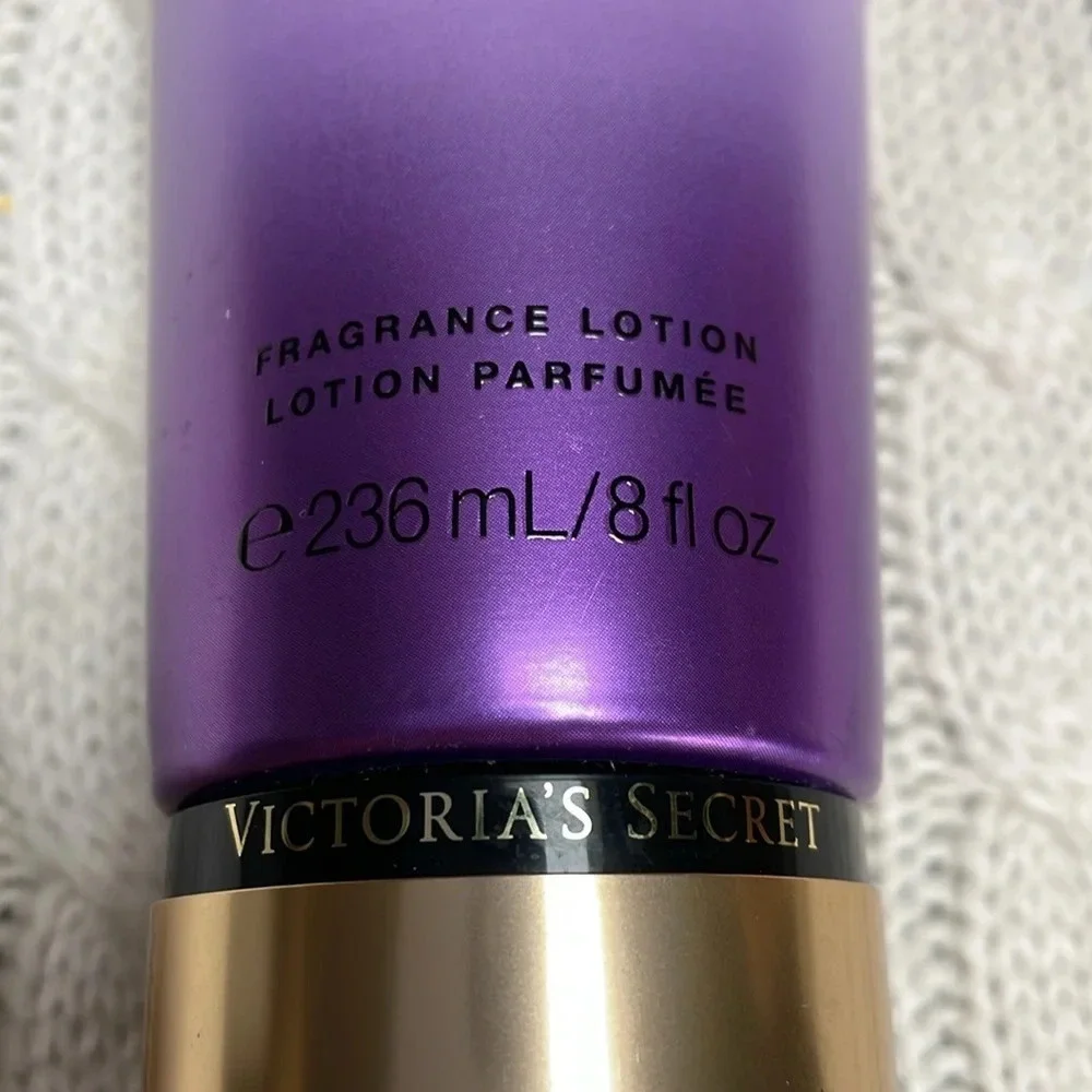 NWOT Victoria Secret Love Spell Body Lotion. 8oz. Purple tube cherry/peach smell
